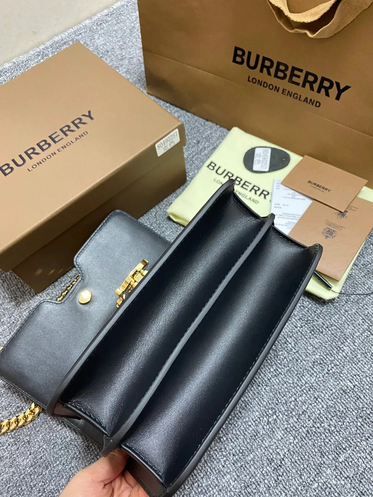 TB 미니 가죽 클러치백 상세