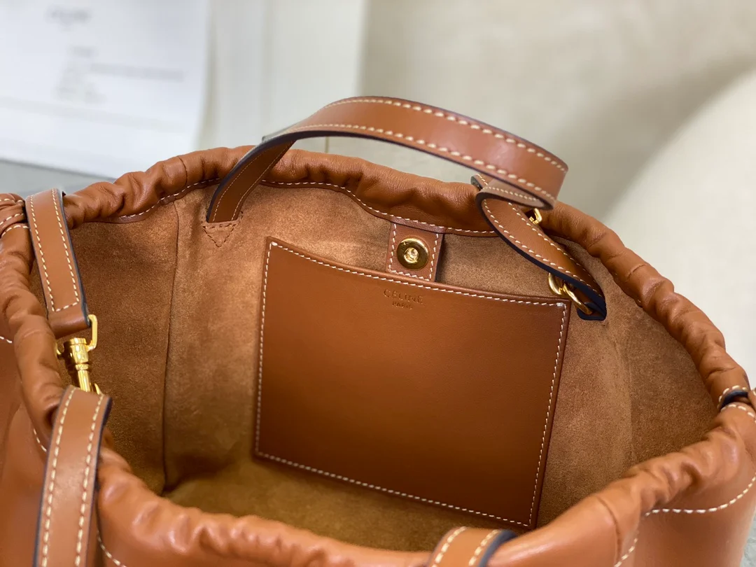 퀴르 트리옹프 스몰 드로우스트링 카바스 상세