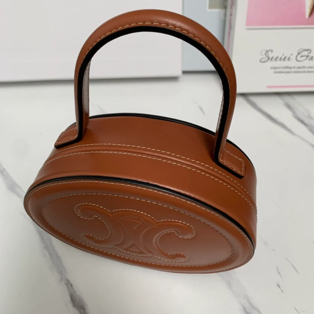 트리옹프 오벌 미노디에르 토트백 탠 상세