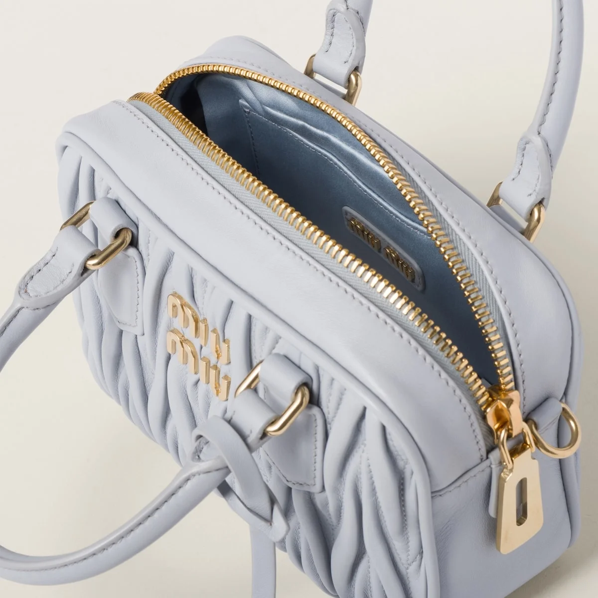 스몰 아르카디 마테라쎄 나파 가죽백 콘플라워 상세