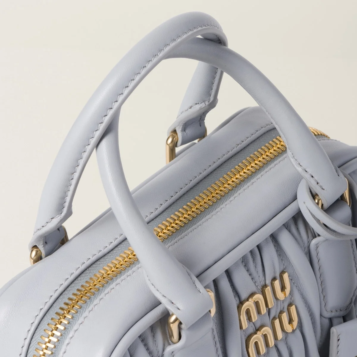 스몰 아르카디 마테라쎄 나파 가죽백 콘플라워 상세