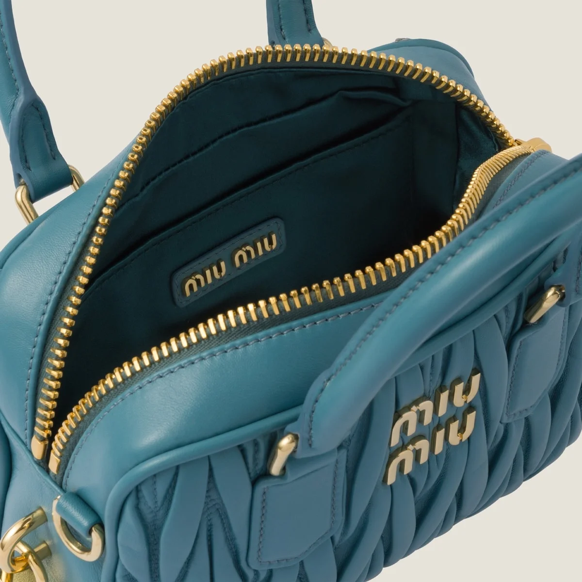 스몰 아르카디 마테라쎄 나파 가죽백 블루 상세