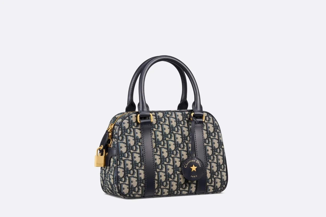 디바이브 블루 오블리크 자카드 미디엄 볼링백 상세