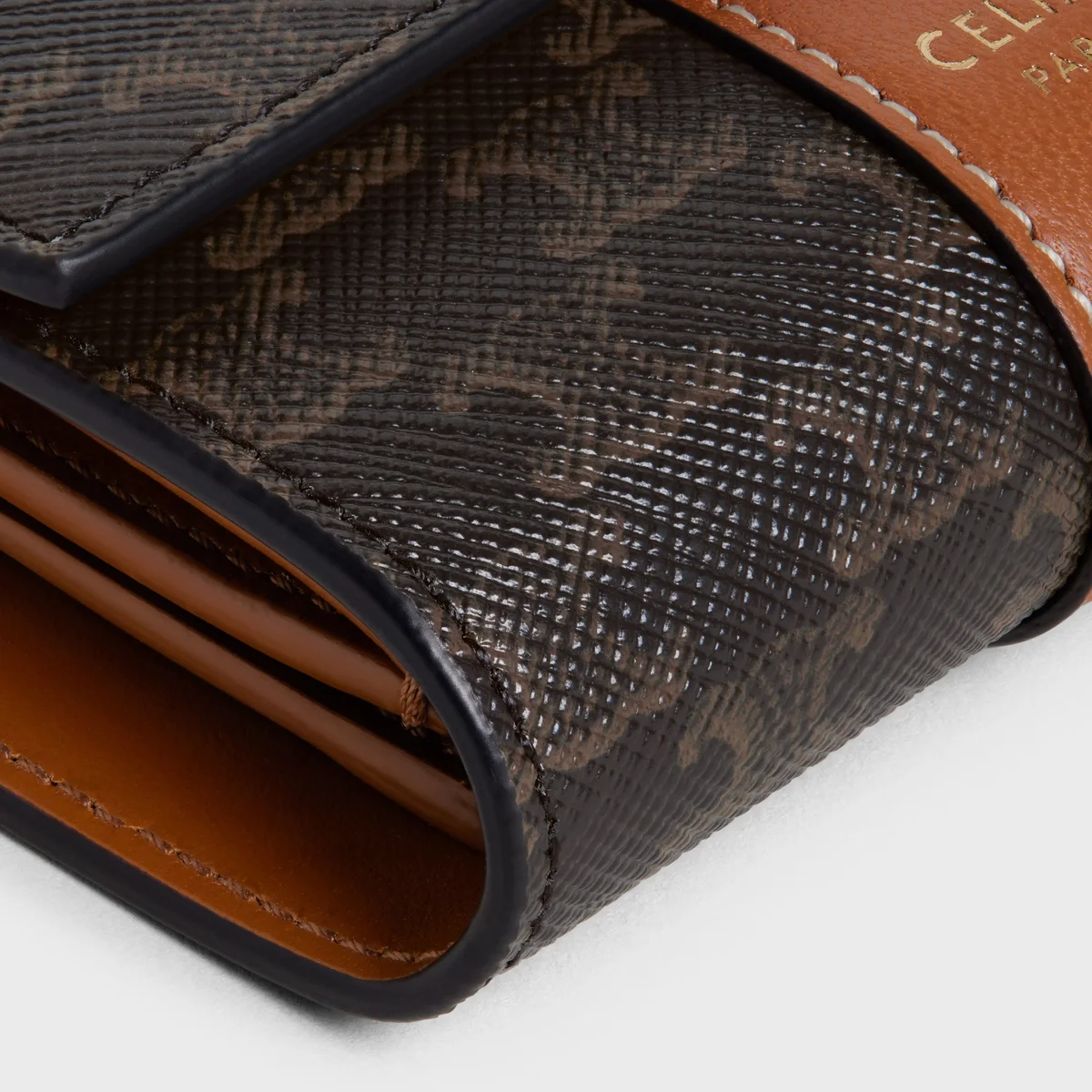 트리옹프 캔버스 스몰 3단 지갑 탠 상세