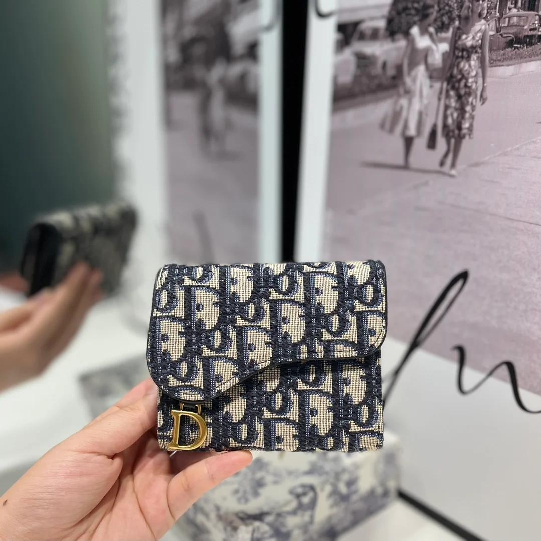 새들 로투스 지갑 블루 상세